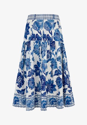 Valge midi seelik laiade siniste lillemustritega ning dekoratiivse sinise äärega ääres ja vöökohal.