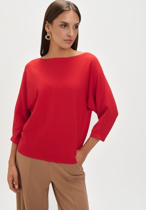 - Sweter