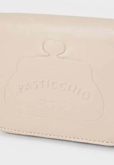 Beige leather bag with a clasp top, featuring embossed text "PASTICCINO WEEKEND" and decorative stitching along the edges.