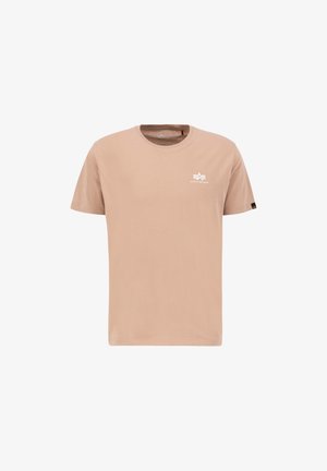 Light beige cotton t-shirt with a crew neck, short sleeves, and a small white logo on the chest. Smooth texture, classic fit.