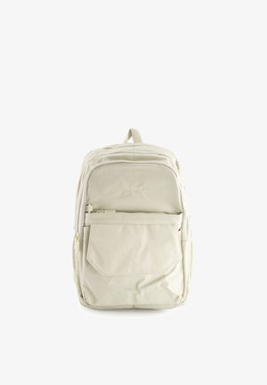 Krémově zbarvený batoh s přední kapsou na zip, horním držadlem a logem "Venezia" umístěným uprostřed předního panelu.