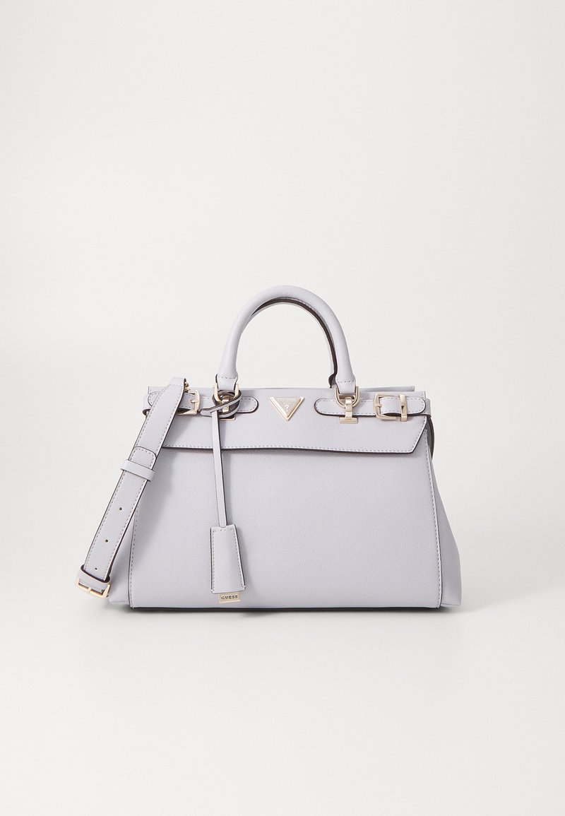 Borsa a mano lilla chiaro in materiale sintetico liscio, forma strutturata, manici doppi, tracolla removibile e dettagli in metallo dorato.