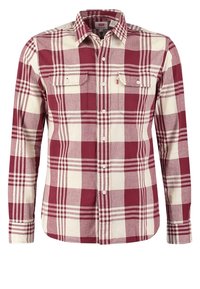 Chemise à manches longues boutonnée avec motif à carreaux rouge et blanc, deux poches poitrine avec rabats à boutons, et col classique.