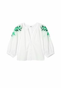 Blusa bianca con maniche a sbuffo, caratterizzata da motivi di foglie verdi ricamati sulle spalle e una chiusura frontale con bottoni. Materiale in cotone.