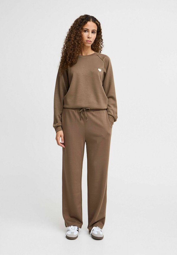 IXSVALA - Tracksuit bottoms - lizard4