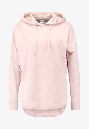 Šviesiai rožinė džemperis, pagamintas iš medvilnės mišinio, turi kengūros kišenę, reguliuojamus raiščius ir šonkauliuotus rankogalius. Palaidi siluetas su apvaliu kraštu.