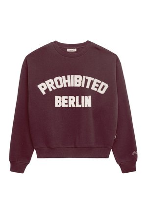 Sweatshirt bordeaux avec le texte blanc "PROHIBITED BERLIN". Présente un col rond et des poignets et un ourlet en maille côtelée. Tissu en coton doux.