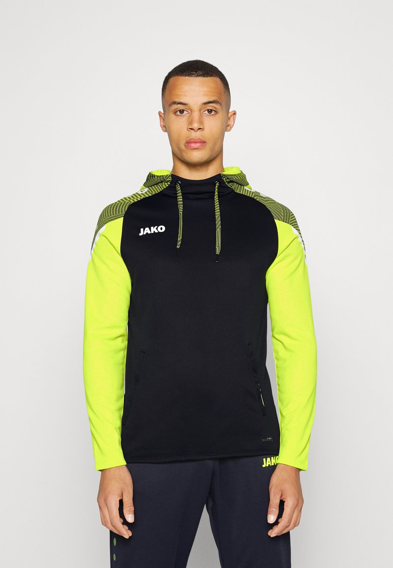 JAKO PERFORMANCE Hoodie shwarz/soft yellow/black Zalando.co.uk