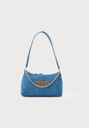 Denim handbag in light blue with a silver chain strap, featuring orange "tommy jeans" embroidery on the front and a zip closure.