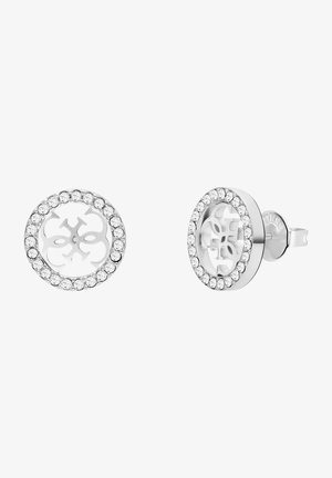 Silver stud earrings featuring a circular design with a cut-out logo at the center, surrounded by a row of sparkling clear crystals.
