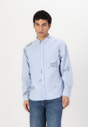 Light blue button-up shirt in soft fabric, featuring black insect illustrations on the front and sleeves, with a chest pocket and pointed collar.