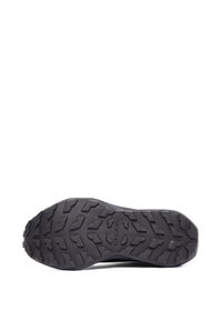 Svart gummisko sula med ett djupt mönstrat däckmönster för grepp. Har en ren design med upphöjd logotyp i mitten.