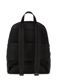 Black leather backpack with textured surface, padded adjustable straps, and a mesh panel. Features a zippered side pocket for storage.