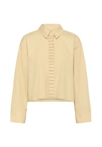 Krótkie, długie rękawy w jasnym żółtym materiale z przednim zapięciem, ozdobionym pionowymi plisami oraz klasycznym kołnierzykiem. Gładka tekstura.