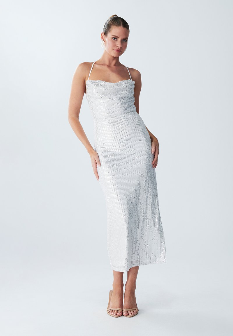 Silver sequin dress with a fitted silhouette, strapless neckline, and mid-calf length. Smooth texture, reflecting light with a subtle shimmer.