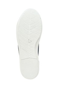 Witte rubberen zool met een gestructureerde oppervlakte en geometrische patronen, gelabeld "Vionic." Gladde, donkergekleurde zijkanten taperen elegant naar de hak.