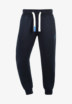 Marineblauwe sweatpants van zacht materiaal, met een tailleband met een trekkoord in het wit, zijzakken en geribbelde manchetten voor een snug fit.