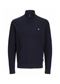 Marinblå zip-up tröja gjord av ribbat tyg. Har en ståkrage, långa ärmar och en liten logotyp på vänster bröst.