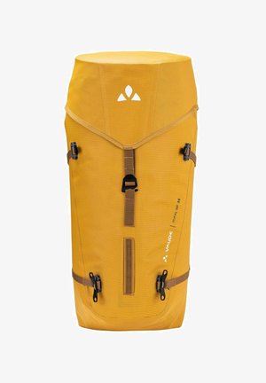Gelber zylindrischer Rucksack aus strukturiertem Stoff mit zwei Seitenriemen, einer vorderen Reißverschlusstasche und einem weißen Logo oben.