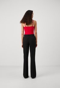 ONLY Tall ONLABBA LIFE FLARED - Nohavice - black