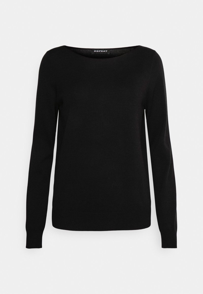 Pull en maille noir à manches longues avec col rond et poignets ajustés sur un fond clair uni.