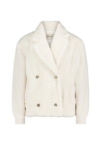 Hvid dobbeltradet jakke med en fluffy shearling-front og strikkede ærmer. Har store dekorative knapper og en sjal-krave.