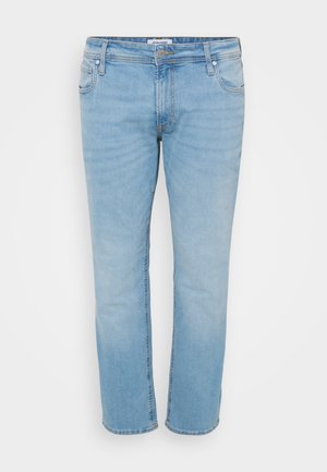 Lysblå denimjeans med rett benkutt, fem lommer, subtil falming, og glidelås med knapp. Syddetaljer på lommene.