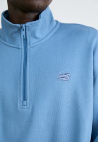 New Balance ATHLETICS 1/2 ZIP - Športni pulover - heron blue