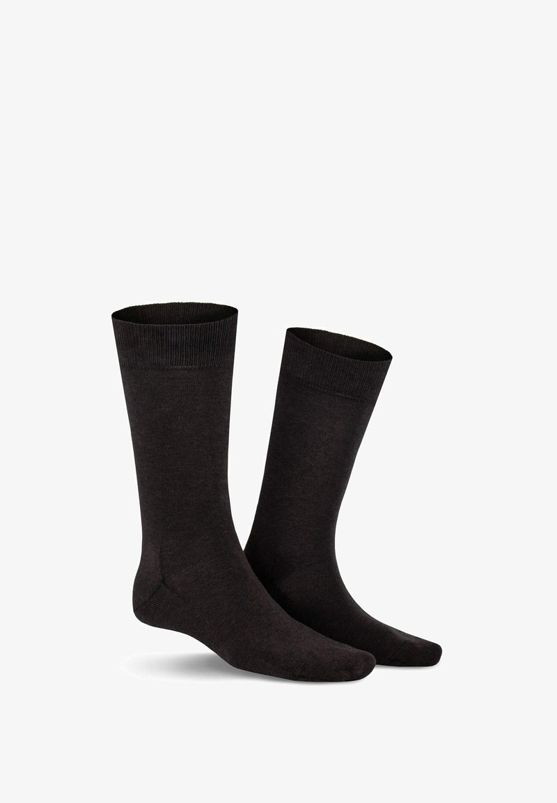 Schwarze Baumwollsocken im Crew-Stil mit glatter Textur, gerippten Bündchen und klassischer Form, ideal für den täglichen Gebrauch.