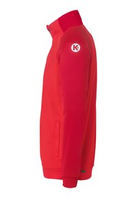 Red zip-up jacket with a high collar, smooth texture, and long sleeves. Features a white logo on the left shoulder and side pockets.