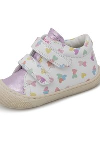 White leather shoe with colorful heart patterns, silver accents, and Velcro straps. Features a textured rubber sole and rounded toe.