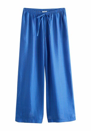 Blue wide-leg pants with vertical thin black and white stripes, elastic waistband, and front tie drawstring.