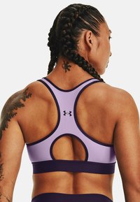 Under Armour KEYHOLE - Sportovní podprsenky se střední oporou - octane
