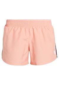 Light pink athletic shorts with an elastic waistband and a small white Nike swoosh on the lower left side.
