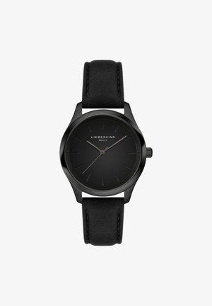 Schwarze Uhr mit einem runden Metallgehäuse und einem glatten, mattschwarzen Zifferblatt. Sie verfügt über ein schwarzes Lederarmband und minimalistische Stundenmarkierungen.