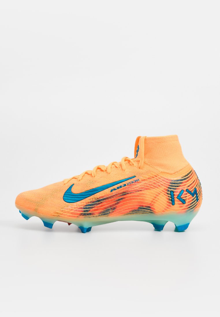 Botines de fútbol para terreno firme