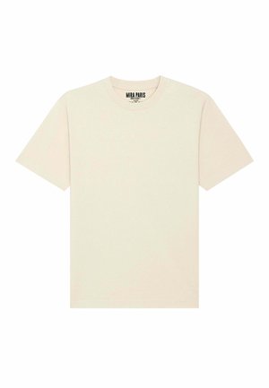 T-shirt à manches courtes de couleur crème en coton doux, avec un col rond et un design simple et minimaliste, avec une étiquette "MIRA PARIS."