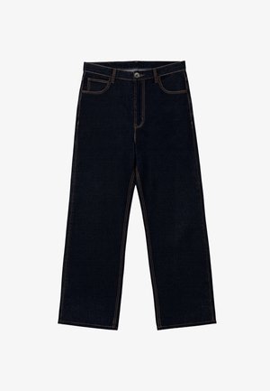 Tmavě modré široké džíny s vysokým pasem, předními knoflíky a zipem a kontrastním oranžovým prošitím.