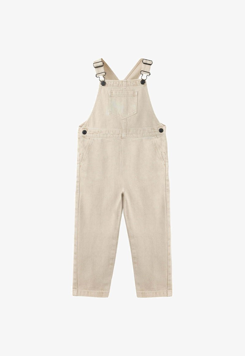 Salopette beige en coton avec bretelles ajustables, poche poitrine à l'avant, boutons latéraux et deux poches latérales.