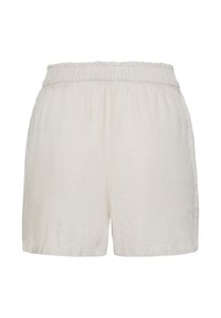 Shorts en lin beige avec taille élastique froncée et poches latérales, vus de dos sur un fond blanc.