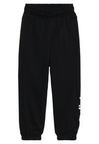 Zwarte sweatpants van zachte stof, met een elastische tailleband, zijzakken en geribbelde boorden. Witte tekstaccenten op één been.