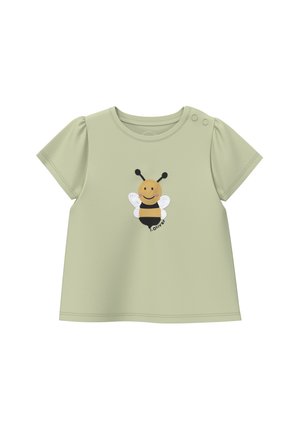 Chemise verte claire à manches courtes pour tout-petit avec manches bouffantes, deux boutons aux épaules et une broderie d'abeille souriante au centre.
