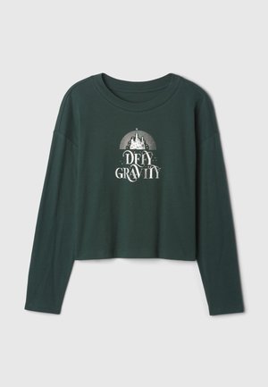Hosszú ujjú, crop top sötétzöld pamutból, fehér "DEFY GRAVITY" felirattal és kastélymotívummal. Puha tapintású, kerek nyakkivágással.