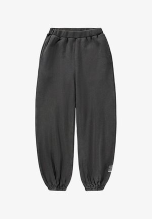 Szare, dziergane spodnie dresowe z elastycznym pasem i mankietami, wyposażone w boczne kieszenie oraz małą metkę z logo po lewej stronie.