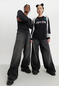YOURTURN by Zalando UNISEX - Platūs džinsai - black denim