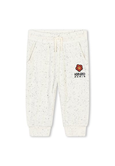 Pantalons de survêtement de couleur claire, à motifs, avec des poignets côtelés, une taille élastique, un cordon de serrage et un logo de fleur rouge brodé sur le côté gauche.