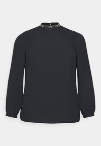 Svart långärmad blus med hög hals och dekorativ pärmkant. Tillverkad av ett mjukt tyg, med rynkade manschetter och en avslappnad passform.