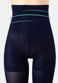 Leggings modellati in vita alta di colore navy, realizzati in materiale opaco, con una texture morbida e cuciture invisibili per un aspetto senza soluzione di continuità.