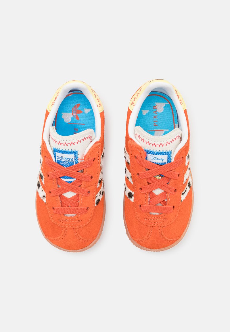 adidas gazelle silver green womens ADIDAS ORIGINALS Women's ADIDAS DISNEY GAZELLE Red Sneakers – Pavidas main image 0