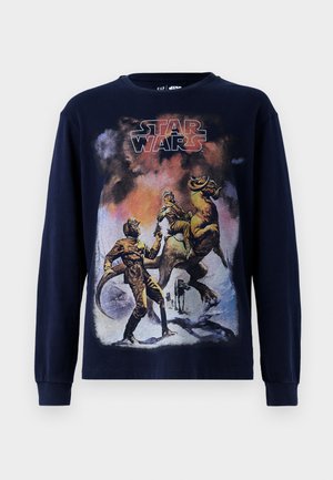 Navy long-sleeve t-shirt featuring a vintage Star Wars graphic illustration, showcasing characters and a creature on a snowy landscape.